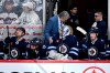 Winnipeg Jets' head coach Rick Bowness speaks with goaltender Connor Hellebuyck (37) after he was pulled for the extra attacker at the end of the third period against the Colorado Avalanche in Game 2 of their NHL hockey Stanley Cup first-round playoff series in Winnipeg, Tuesday April 23, 2024. Rick Bowness always goes to bed with hockey looping in his mind, but Tuesday night’s thoughts weren’t all bad for the Winnipeg Jets head coach. THE CANADIAN PRESS/Fred Greenslade