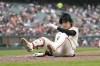 San Francisco Giants' Jung Hoo Lee reacts after avoiding a pitch against the New York Mets during the eigh inning of a baseball game in San Francisco, Wednesday, April 24, 2024. (AP Photo/Jeff Chiu)