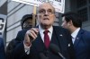 FILE - Former Mayor of New York Rudy Giuliani speaks during a news conference outside the federal courthouse in Washington, Dec. 15, 2023. Guiliani, a lawyer for former President Donald Trump, was among those indicted Wednesday, April 24, 2024, in an Arizona election interference case.(AP Photo/Jose Luis Magana, File)