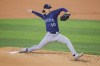 Seattle Mariners starting pitcher Bryce Miller delivers a pitch during the first inning of a baseball game against the Texas Rangers, Wednesday, April 24, 2024, in Arlington, Texas. (AP Photo/Gareth Patterson)