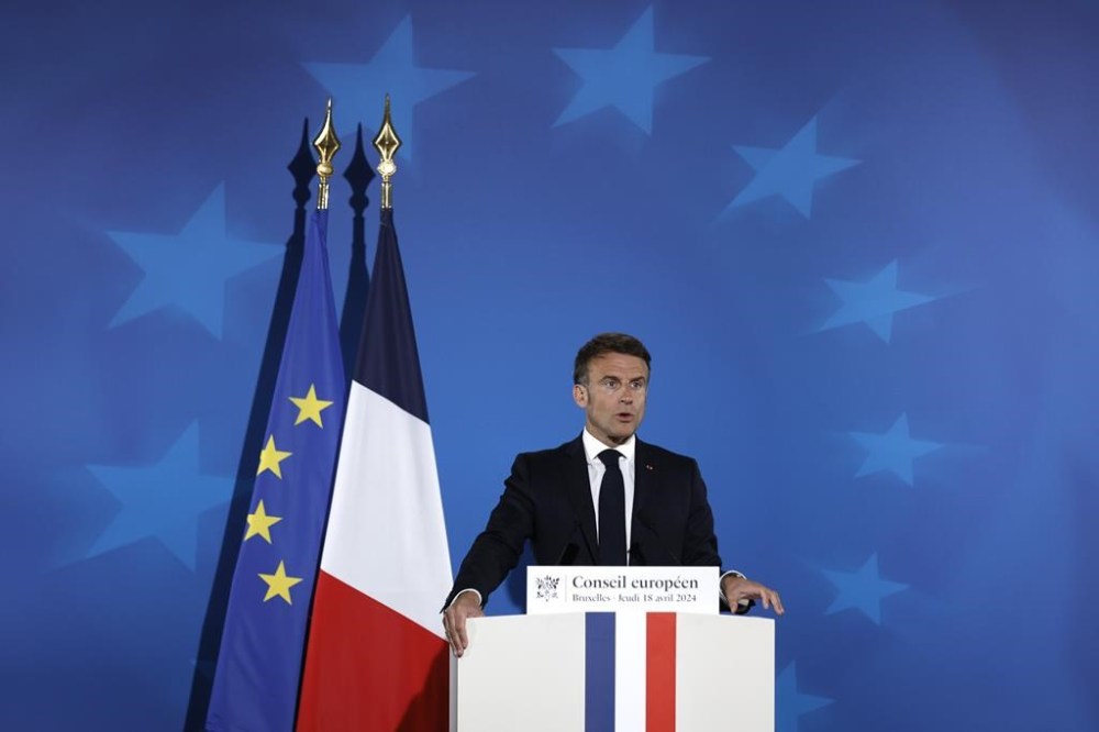 French President Emmanuel Macron speaks during a media conference at an EU summit in Brussels, Thursday, April 18, 2024. European Union leaders on Wednesday debated a new