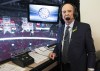 Legendary broadcaster Bob Cole poses before calling his last NHL hockey game between the Montreal Canadiens and the Toronto Maple Leafs in Montreal, Saturday, April 6, 2019. Broadcaster Cole, a welcome voice for Canadian hockey fans for a half-century, has died at the age of 90. THE CANADIAN PRESS/Graham Hughes