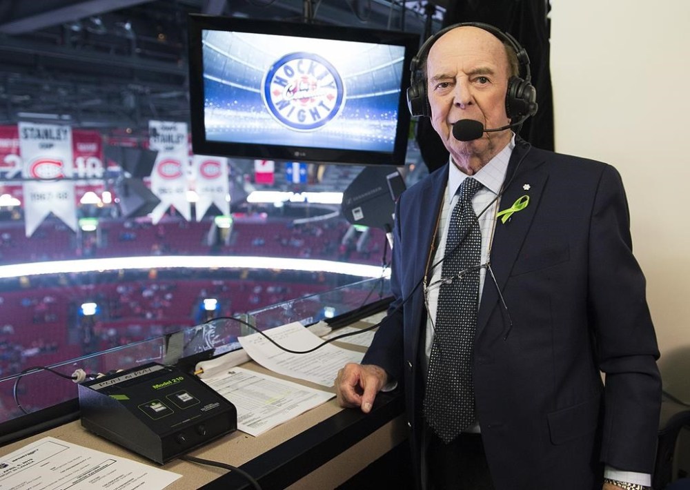 Legendary broadcaster Bob Cole poses before calling his last NHL hockey game between the Montreal Canadiens and the Toronto Maple Leafs in Montreal, Saturday, April 6, 2019. Broadcaster Cole, a welcome voice for Canadian hockey fans for a half-century, has died at the age of 90. THE CANADIAN PRESS/Graham Hughes