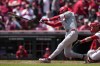 Philadelphia Phillies' Trea Turner loses the grip on his bat as he swings at a pitch in the first inning of a baseball game against the Cincinnati Reds, Thursday, April 25, 2024, in Cincinnati. The Phillies won 5-0. (AP Photo/Carolyn Kaster)