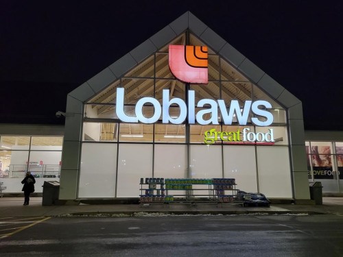 It was evident to the federal government as early as last fall that Loblaw and Walmart might be holdouts to the grocery code of conduct, jeopardizing the project's success. A Loblaws grocery store is shown at a Bowmanville, Ont. shopping centre on Tuesday Feb. 28, 2023. THE CANADIAN PRESS/Doug Ives