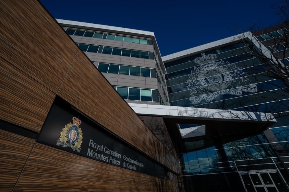 The B.C. RCMP Divisional Headquarters is seen, in Surrey, B.C., on Thursday, Jan. 11, 2024. An inquest jury looking into the police shooting deaths of a man and the woman he was holding hostage has recommended that events involving the emergency response team be recorded with both video and audio. THE CANADIAN PRESS/Ethan Cairns