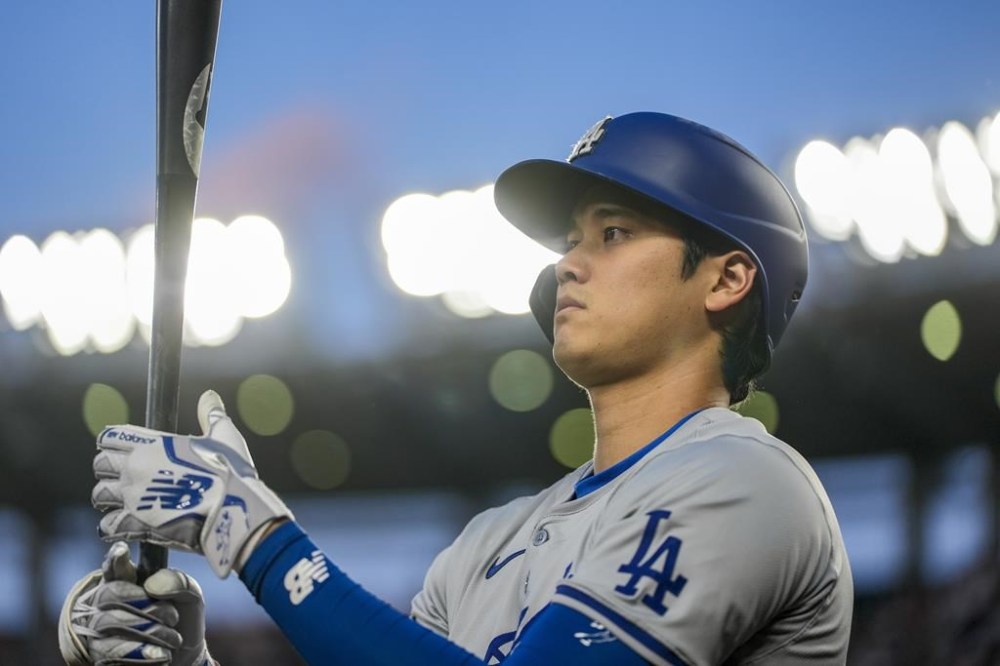 Los Angeles Dodgers designated hitter Shohei Ohtani prepares to bat during the fourth inning of the team's baseball game against the Washington Nationals at Nationals Park, Wednesday, April 24, 2024, in Washington. Shohei Ohtani will play his first game in Toronto on Friday since opting to sign with the Los Angeles Dodgers instead of the Blue Jays. THE CANADIAN PRESS/AP, Alex Brandon