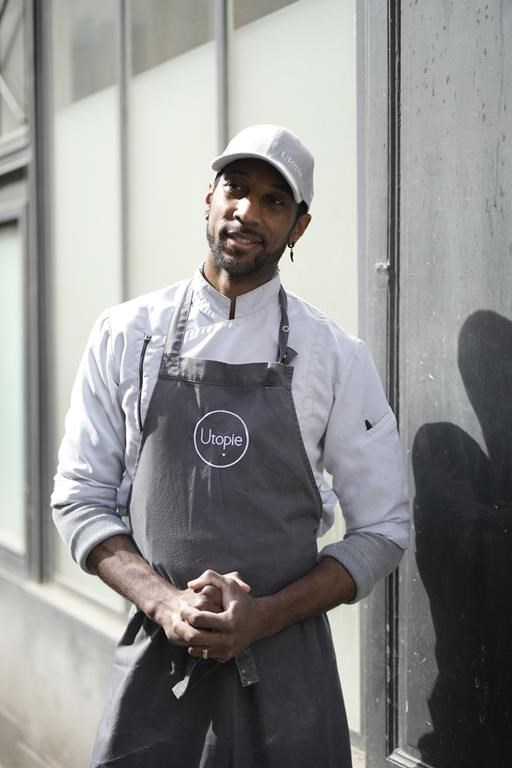 Baker Xavier Netry poses outside the Utopie bakery Friday, April 26, 2024 in Paris. Baker Xavier Netry was chosen this week as the 31st winner of Paris' annual