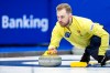 Sweden's Rasmus Wranaa delivers a stone against Japan at the World men's Curling Championship, at the IWC Arena in Schaffhausen, Switzerland on Sunday March 31, 2024. THE CANADIAN PRESS/Keystone via AP-Michael Buholzer