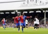Crystal Palace's Jeffrey Schlupp celebrates after scoring his sides first goal during the English Premier League soccer match between Fulham and Crystal Palace at Craven Cottage, London, Saturday, April 27, 2024. (Zac Goodwin/PA via AP)