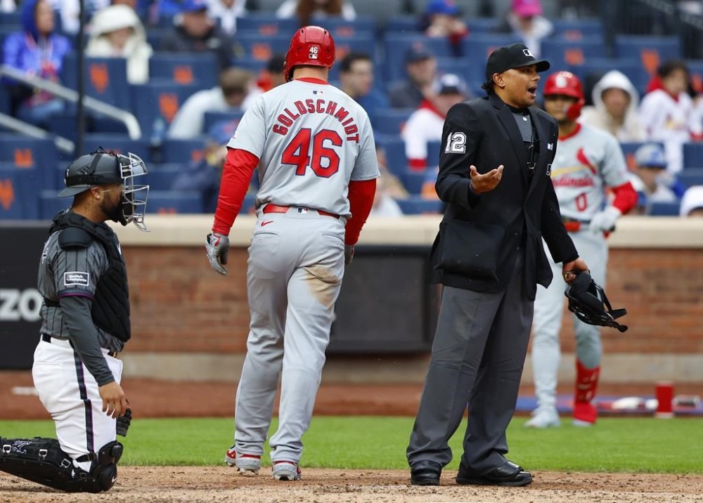 St. Louis Cardinals' Paul Goldschmidt (46) scores a run after New York Mets pitcher Josh Walker balked during the fifth inning of a baseball game, Saturday, April 27, 2024, in New York. (AP Photo/Noah K. Murray)