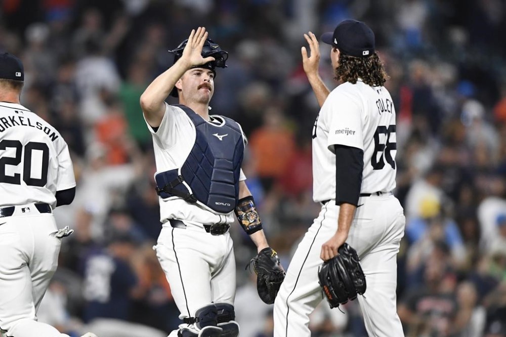 Detroit Tigers catcher Jake Rogers, left, congratulates relief pitcher Jason Foley at the end of a baseball game against the Kansas City Royals on Saturday, April 27, 2024, in Detroit. (AP Photo/Jose Juarez)