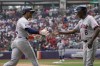 Houston Astros shortstop Jeremy Peña, left, runs the bases after hitting a solo home run against the Colorado Rockies during fourth inning of a baseball game at Alfredo Harp Helu stadium in Mexico City, Sunday, April 28, 2024. (AP Photo/Fernando Llano)