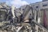 Palestinians look at the destruction after an Israeli airstrike in Rafah, Gaza Strip. Monday, April 29, 2024. (AP Photo/Mohammad Jahjouh)