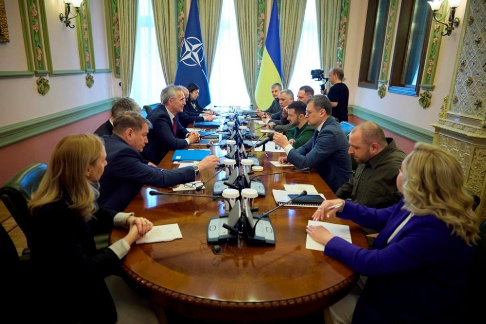 Ukrainian President Volodymyr Zelenskyy, center right, talks with NATO Secretary General Jens Stoltenberg, centre left, during their meeting in Kyiv Ukraine, Monday, April 29, 2024. (Ukrainian Presidential Press Office via AP)