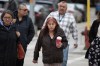 Donna Bartlett (centre), the grandmother of Marcedes Myran, walks to the Court of King’s Bench of Manitoba building in downtown Winnipeg, where the trial of Jeremy Skibicki, the man accused of killing Myran and three other women is set to begin, on Monday, April 29, 2024. THE CANADIAN PRESS/Daniel Crump.