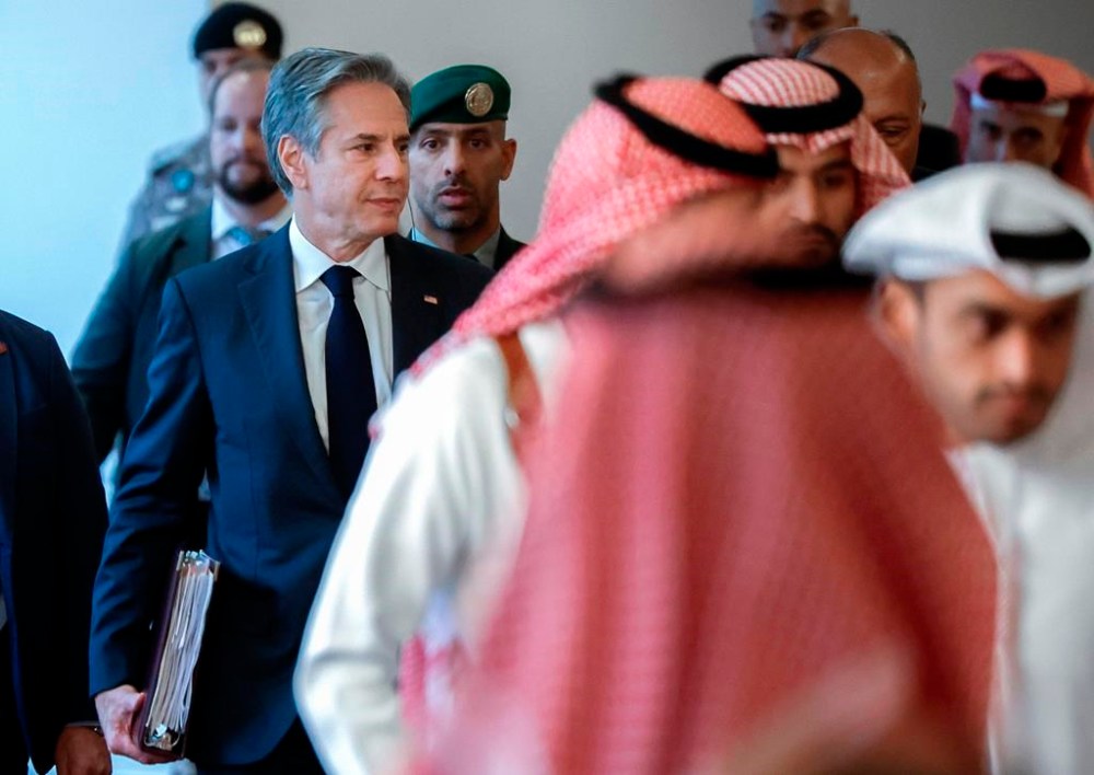 U.S.Secretary of State Antony Blinken holds files as walks to the U.S.-Arab Quint Meeting with representatives from Egypt, Jordan, Saudi Arabia, Qatar, the United Arab Emirates and the Palestinian Authority, at the Four Seasons Hotel in Riyadh, Saudi Arabia, Monday, April 29, 2024. (Evelyn Hockstein/Pool Photo via AP)