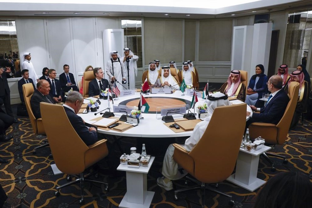 U.S. Secretary of State Antony Blinken, sitting third from left, attends the U.S.-Arab Quint Meeting with representatives from Egypt, Jordan, Saudi Arabia, Qatar, the United Arab Emirates and the Palestinian Authority, at the Four Seasons Hotel in Riyadh, Saudi Arabia, Monday April 29, 2024. (Evelyn Hockstein/Pool via AP)
