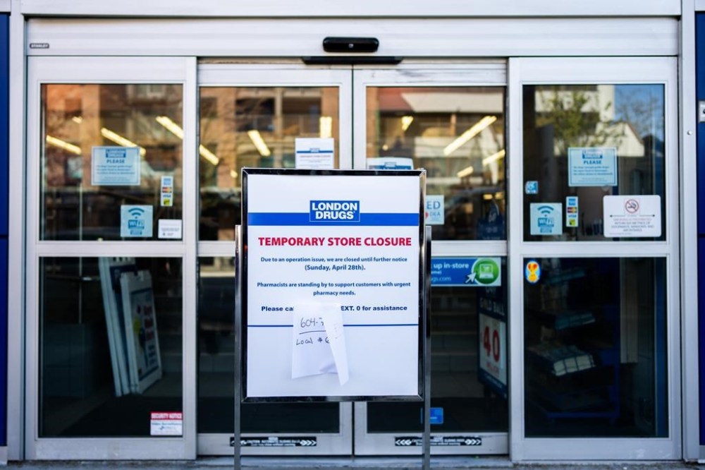 A store closure sign sits outside of the London Drugs Broadway and Vine location in Vancouver on Monday, April. 29, 2024. London Drugs says it has temporarily closed all of its stores in Western Canada as it grapples with a
