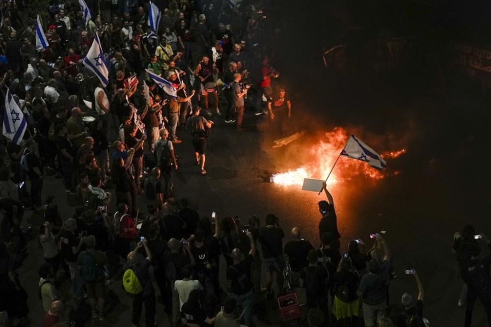 Relatives and supporters of the Israeli hostages held in the Gaza Strip by the Hamas militant group call for their release during a protest in Tel Aviv, Monday, April 29, 2024. (AP Photo/Ohad Zwigenberg)