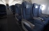 Air Canada is pressing pause on a new seat selection fee after social media backlash against the days-old policy. Airline seats are seen during a flight from Vancouver to Calgary on Tuesday, June 9, 2020. THE CANADIAN PRESS/Jonathan Hayward