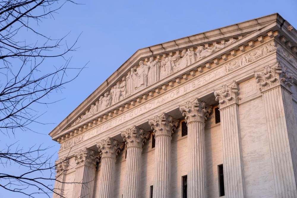 FILE - The Supreme Court of the United States is seen in Washington, March 26, 2024. The Supreme Court has refused to block a Texas law requiring pornographic websites to verify the age of their users. The justices on Tuesday rejected an emergency appeal filed by the Free Speech Coalition, a trade association for the adult entertainment industry. The provision of House Bill 1181, signed into law by Gov. Greg Abbott, remains in effect even as the association’s full appeal is weighed by the Supreme Court. (AP Photo/Amanda Andrade-Rhoades, File)