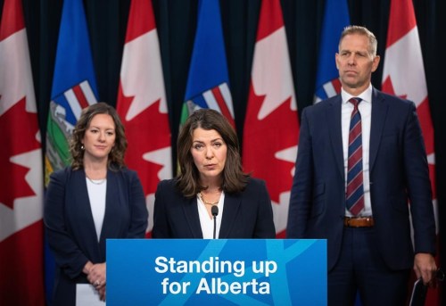 Alberta Premier Danielle Smith speaks on invoking her government’s sovereignty act over federal clean energy regulations, along with Rebecca Schulz, Minister of Environment and Protected Areas and Nathan Neudorf, Minister of Affordability and Utilities, in Edmonton on Monday, Nov. 27, 2023. The Alberta government is helping fund what it says is Canada's first test site for geothermal energy drilling techniques.THE CANADIAN PRESS/Jason Franson.