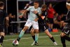 Pacific FC's Manny Aparicio, left, protects the ball from TSS Rovers' Matteo Polisi during second-half Canadian Championship quarterfinal soccer action in Langford, B.C., on Wednesday, May 10, 2023. THE CANADIAN PRESS/Chad Hipolito