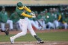 Oakland Athletics' Tyler Nevin hits an RBI single against the Pittsburgh Pirates during the second inning of a baseball game in Oakland, Calif., Tuesday, April 30, 2024. (AP Photo/Jeff Chiu)