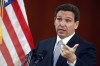 FILE - Florida Gov. Ron DeSantis answers questions from the media, March 7, 2023, at the state Capitol in Tallahassee, Fla. Florida's ban on abortions after six weeks of pregnancy, before many women even know they are pregnant, went into effect Wednesday, May 1, 2024. The Florida Supreme Court, with five of its seven members appointed by DeSantis, ruled 6-1 last month to uphold the state's ban on most abortions after 15 weeks of pregnancy, which cleared the way for the six-week ban. (AP Photo/Phil Sears, File)