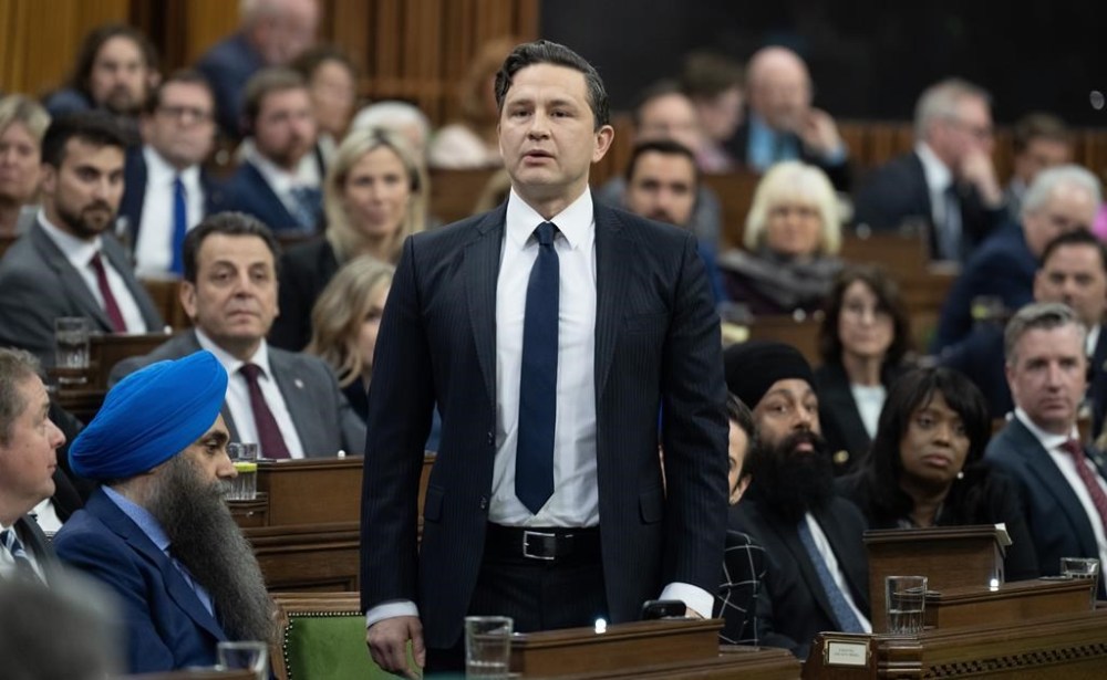 Conservative Leader Pierre Poilievre rises in response to the Speaker asking him to withdraw language
during Question Period, Tuesday, April 30, 2024 in Ottawa. Conservative MPs are calling on Commons Speaker Greg Fergus to resign after ejecting their leader during a heated debate, where they say equal rules were not applied to Prime Minister Justin Trudeau. THE CANADIAN PRESS/Adrian Wyld