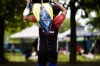 An athlete carries their boat away from the water at the Canadian Sprint Canoe and Kayak Championships at Mooney's Bay in Ottawa, on Sunday, Aug. 29, 2021. Rowing Canada chief executive officer Terry Dillon will step down next month ahead of the 2024 Olympic and Paralympic Games in Paris. THE CANADIAN PRESS/Justin Tang
