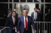 Former President Donald Trump walks outside the courtroom of his trial at Manhattan criminal court, Tuesday, April 30, 2024, in New York. (Curtis Means/Pool Photo via AP)