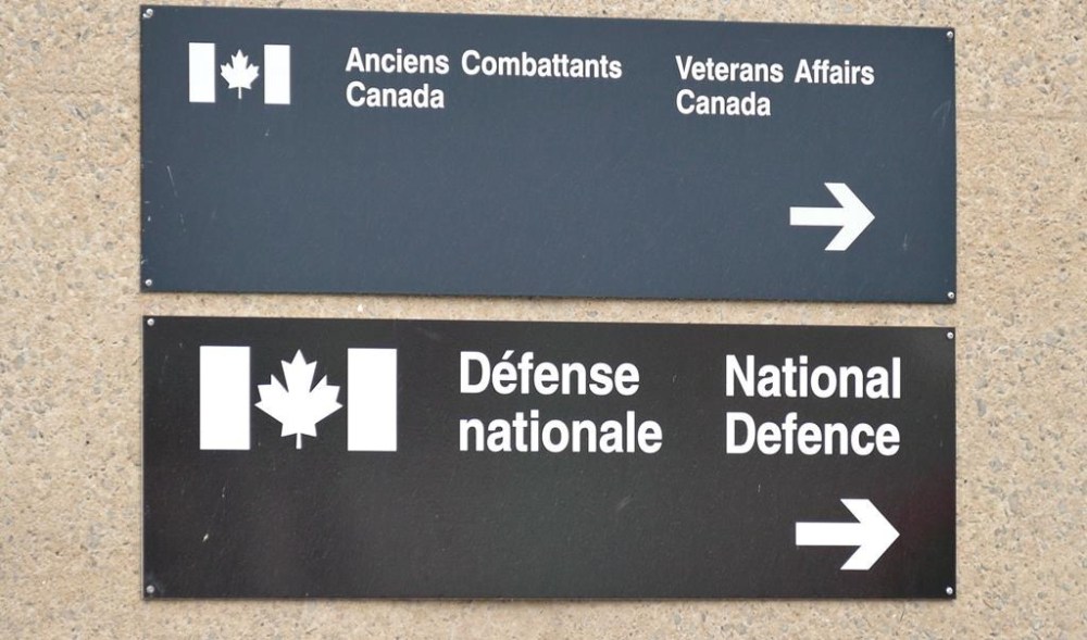 Veterans Affairs staff had to try to explain over the Easter weekend why one of their social media posts about the holiday didn't actually mention it by name. Signs for a National Defence and Veterans affairs office is pictured in St-Jean-sur-Richelieu on Monday Oct. 20, 2014. THE CANADIAN PRESS/Pascal Marchand