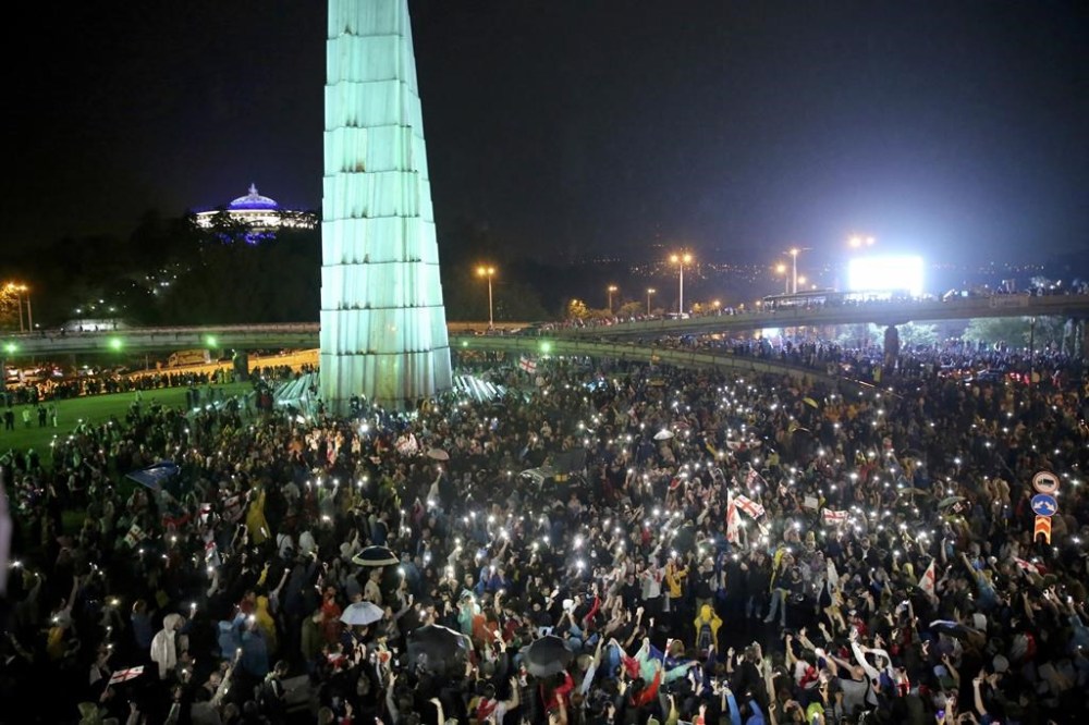Demonstrators gather in the Heroes Square during an opposition protest against