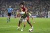 FILE - Fenerbahce's Miguel Crespo, front, and Galatasaray's Sacha Boey battle for the ball during a Turkish Super Lig soccer match between Fernerbahce and Galatasaray at Sukru Saracoglu stadium in Istanbul, Turkey, on Dec. 24, 2023. (AP Photo)