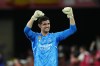 FILE - Real Madrid's goalkeeper Thibaut Courtois celebrates at the end of the Copa del Rey soccer final after they defeated Osasuna 2-1 at La Cartuja stadium in Seville, Spain, on May 6, 2023. Courtois is ready to play his first game of the season against Cadiz on Saturday after recovering from a long injury layoff, coach Carlo Ancelotti said Friday May 3, 2024. (AP Photo/Jose Breton, File)