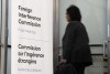 A person makes their way to the Public Inquiry Into Foreign Interference in Federal Electoral Processes and Democratic Institutions, in Ottawa, Wednesday, March 27, 2024. THE CANADIAN PRESS/Adrian Wyld