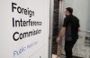 A person enters the Public Inquiry Into Foreign Interference in Federal Electoral Processes and Democratic Institutions as it begins hearings in Ottawa, Monday, Jan. 29, 2024. THE CANADIAN PRESS/Adrian Wyld