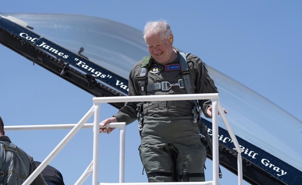 Air Force Secretary Frank Kendall smiles after a test flight of the X-62A VISTA aircraft against a human-crewed F-16 aircraft in the skies above Edwards Air Force Base, Calif., on Thursday, May 2, 2024. The flight on the Artificial Intelligence-controlled VISTA is serving as a public statement of confidence in the future role of AI in air combat. The military is planning to use the technology to operate an unmanned fleet of 1,000 aircraft. (AP Photo/Damian Dovarganes)