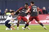 Toronto FC coach John Herdman says he is looking forward to another Canadian Championship cup tie against a semi-pro side in CS Saint-Laurent. Simcoe County Rovers' Alejandro Portal, left, battles for the ball with Toronto FC's Cassius Mailula and Jonathan Osorio during first half Canadian Championship soccer action, in Toronto, Wednesday, April 24, 2024. THE CANADIAN PRESS/Chris Young