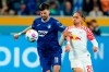 Hoffenheim's Florian Grillitsch, left, and Leipzig's Xavi Simons battle for the ball during the Bundesliga soccer match between TSG 1899 Hoffenheim and RB Leipzig at PreZero Arena, Sinsheim, Germany, Friday May 3, 2024. (Uwe Anspach/dpa via AP)
