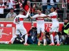 From left, Stuttgart's Deniz Undav, scorer Leonidas Stergiou and Jamie Leweling celebrate the first goal of the match, during the German Bundesliga soccer match between Bayern Munich and VfB Stuttgart, in Stuttgart, Germany, Saturday, May 4, 2024. (Bernd Wei'brod/dpa via AP)