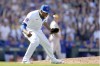 Chicago Cubs relief pitcher Héctor Neris celebrates after the last out of the team's 6-5 win over the Milwaukee Brewers in a baseball game Saturday, May 4, 2024, in Chicago. (AP Photo/Charles Rex Arbogast)