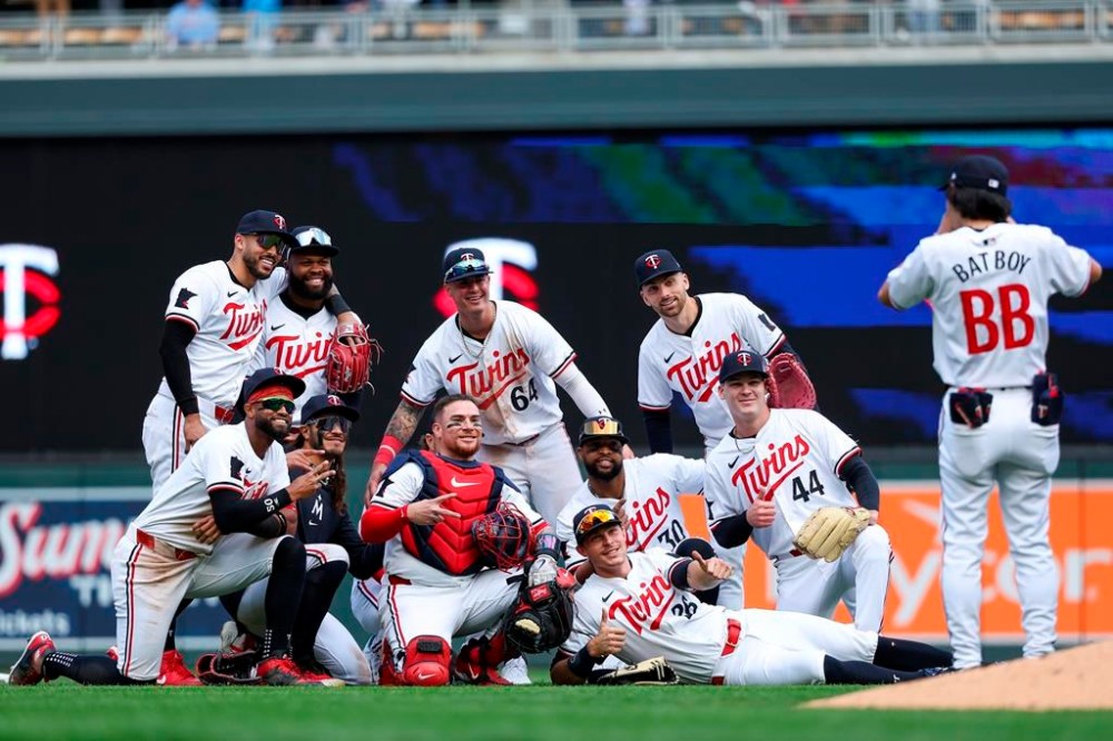 Members of the Minnesota Twins celebrate their team's win over the Boston Red Sox in a baseball game, Saturday, May 4, 2024, in Minneapolis. (AP Photo/Matt Krohn)