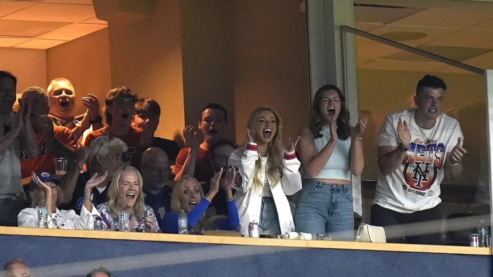 New York Mets pitcher Christian Scott's family celebrates after Scott struck out Tampa Bay Rays' Harold Ramirez during the fourth inning of a baseball game Saturday, May 4, 2024, in St. Petersburg, Fla. Scott is making his major league debut. (AP Photo/Chris O'Meara)