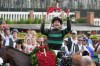 Brian Hernandez Jr. celebrates in the winner's circle after riding Mystik Dan to win the 150th running of the Kentucky Derby horse race at Churchill Downs Saturday, May 4, 2024, in Louisville, Ky. (AP Photo/Jeff Roberson)
