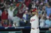 Philadelphia Phillies' Bryce Harper celebrates after hitting a three-run home run off of San Francisco Giants major league assistant coach Alyssa Nakken during the third inning of a baseball game, Sunday, May 5, 2024, in Philadelphia. (AP Photo/Matt Rourke)