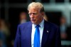 Former President Donald Trump speaks to media as he returns to his trial at the Manhattan Criminal Court, Friday, May 3, 2024, in New York. (Charly Triballeau/Pool Photo via AP)