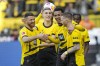 Dortmund's Felix Nmecha, second from right, celebrates with his teammates after he scored his side's fifth goal during the German Bundesliga soccer match between Borussia Dortmund and Augsburg, in Dortmund, Saturday, May 4, 2024. (AP Photo/Martin Meissner)